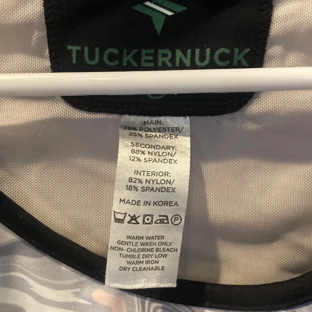 Tuckernuck size small pink black and gray marble patterned sports bra EUC